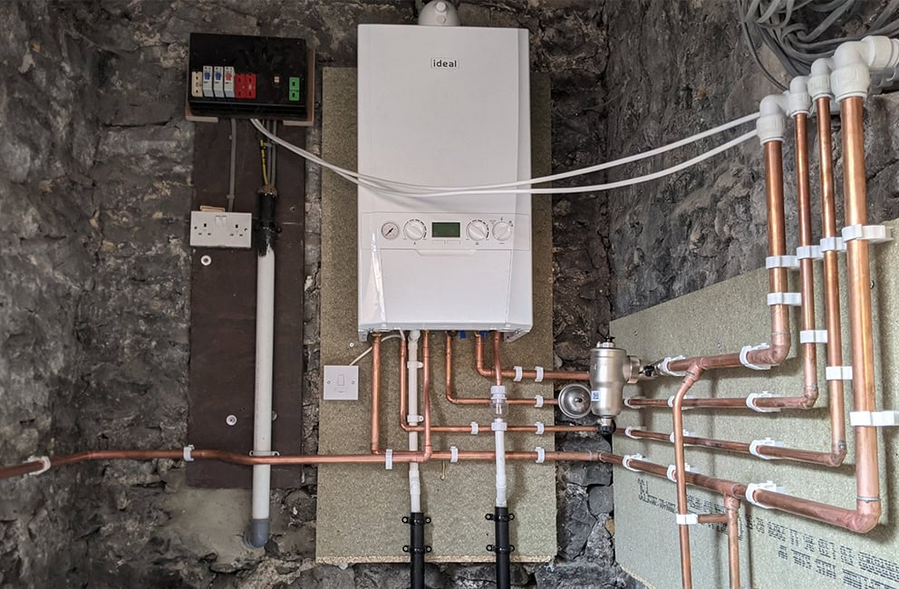 Modern boiler installed in a utility room