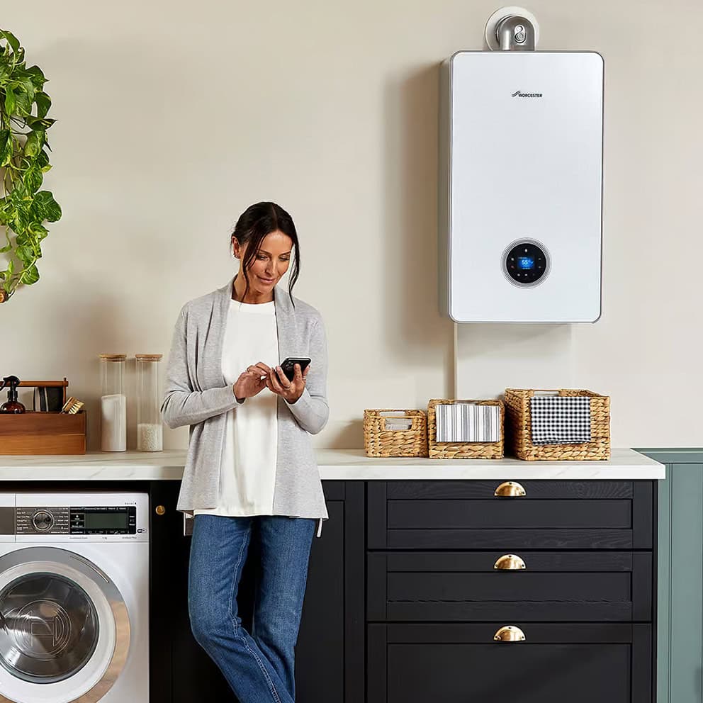 Love Your Boiler heating engineer installing a boiler in Sheffield